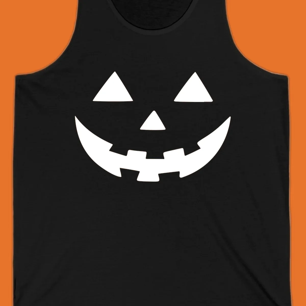 Classic jack o lantern face graphic with triangle eyes and jagged smile.