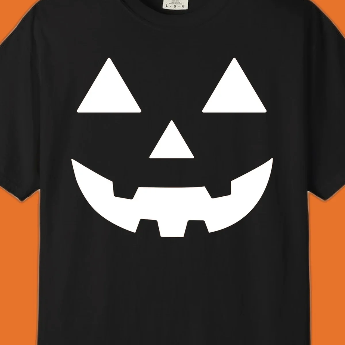 Classic Jack O' Lantern face with triangle eyes, nose, and jagged smile, rendered in white on black and black on white.