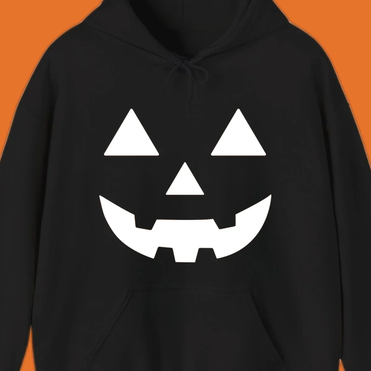Classic Jack O' Lantern face with triangle eyes, nose, and jagged smile, rendered in white on black and black on white.