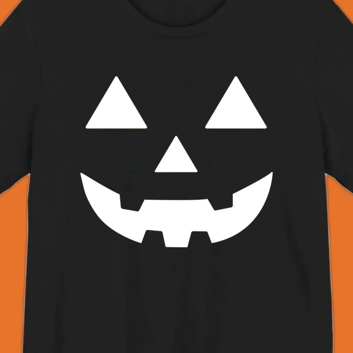 Classic Jack O' Lantern face with triangle eyes, nose, and jagged smile, rendered in white on black and black on white.