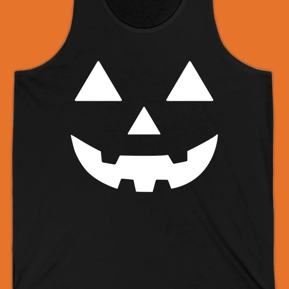 Classic Jack O' Lantern face with triangle eyes, nose, and jagged smile, rendered in white on black and black on white.