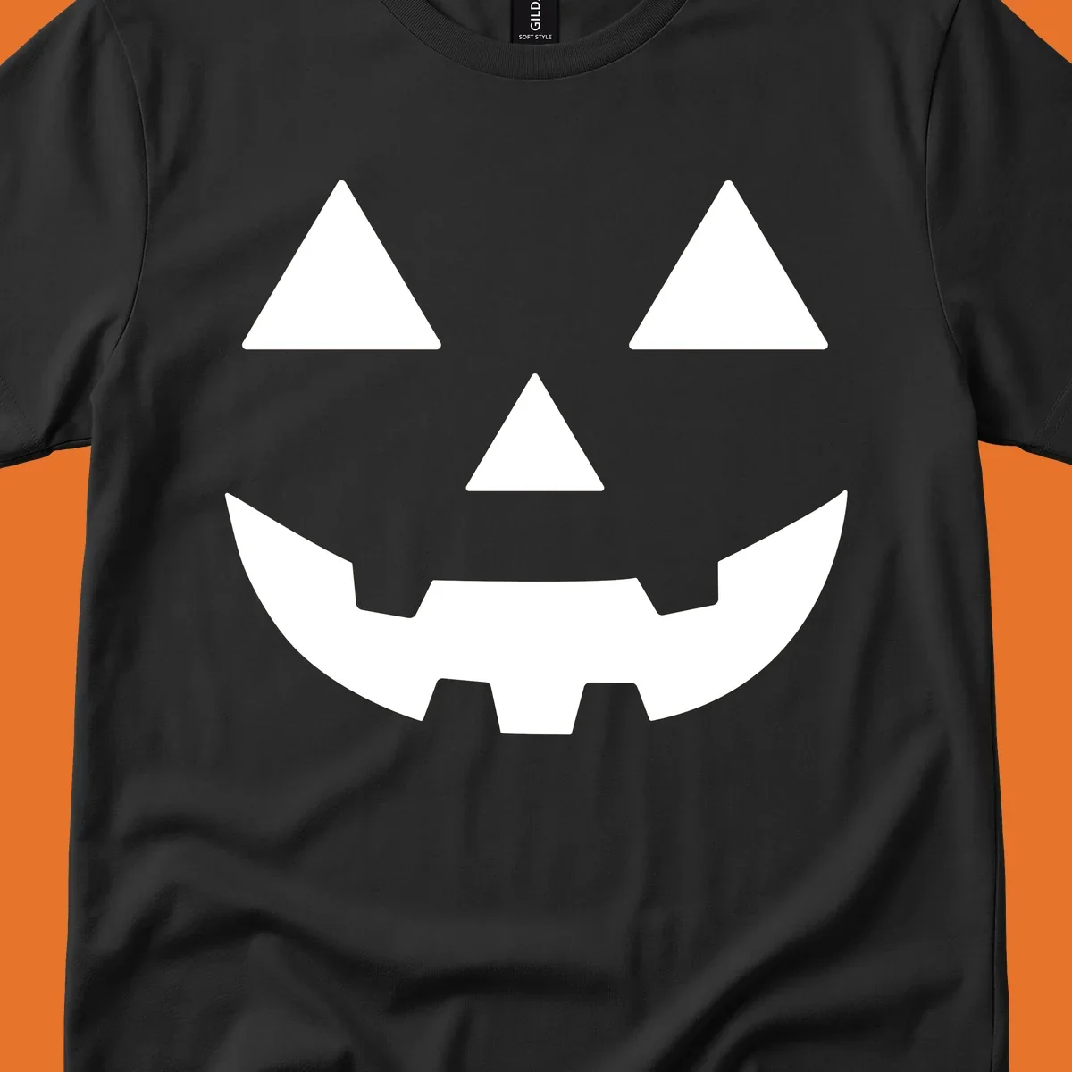 Classic Jack O' Lantern face with triangle eyes, nose, and jagged smile, rendered in white on black and black on white.