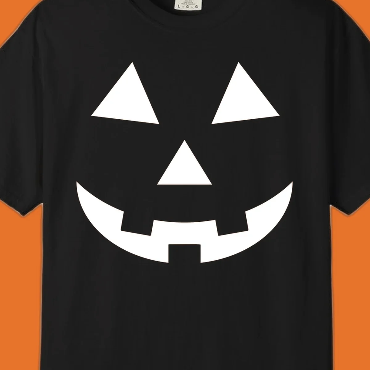 Classic jack o lantern face graphic with triangle eyes and jagged smile. Halloween design.