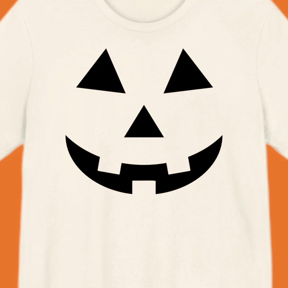 Classic jack o lantern face graphic with triangle eyes and jagged smile. Halloween design.