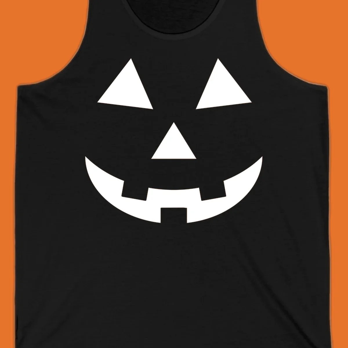 Classic jack o lantern face graphic with triangle eyes and jagged smile. Halloween design.