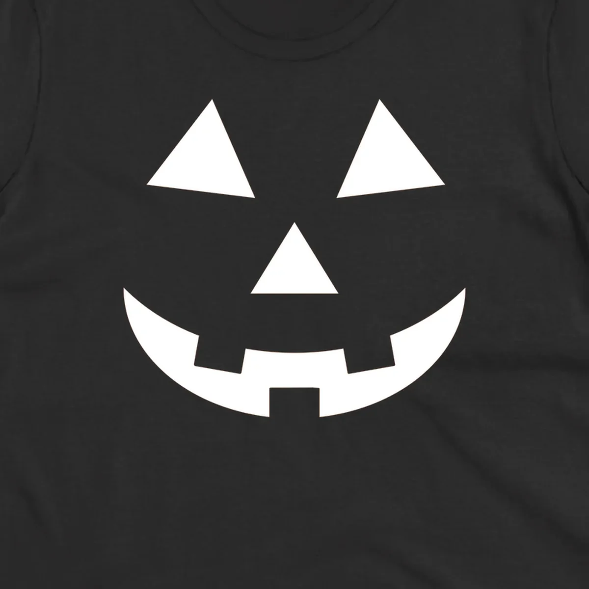 Classic jack-o-lantern face with triangle eyes and jagged smile. Halloween graphic.