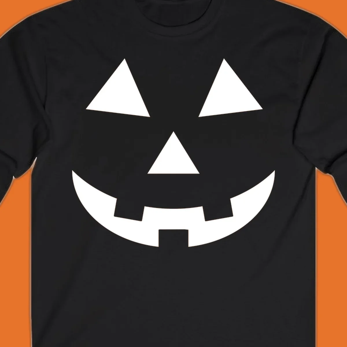 Classic jack-o-lantern face with triangle eyes and jagged smile. Halloween graphic.