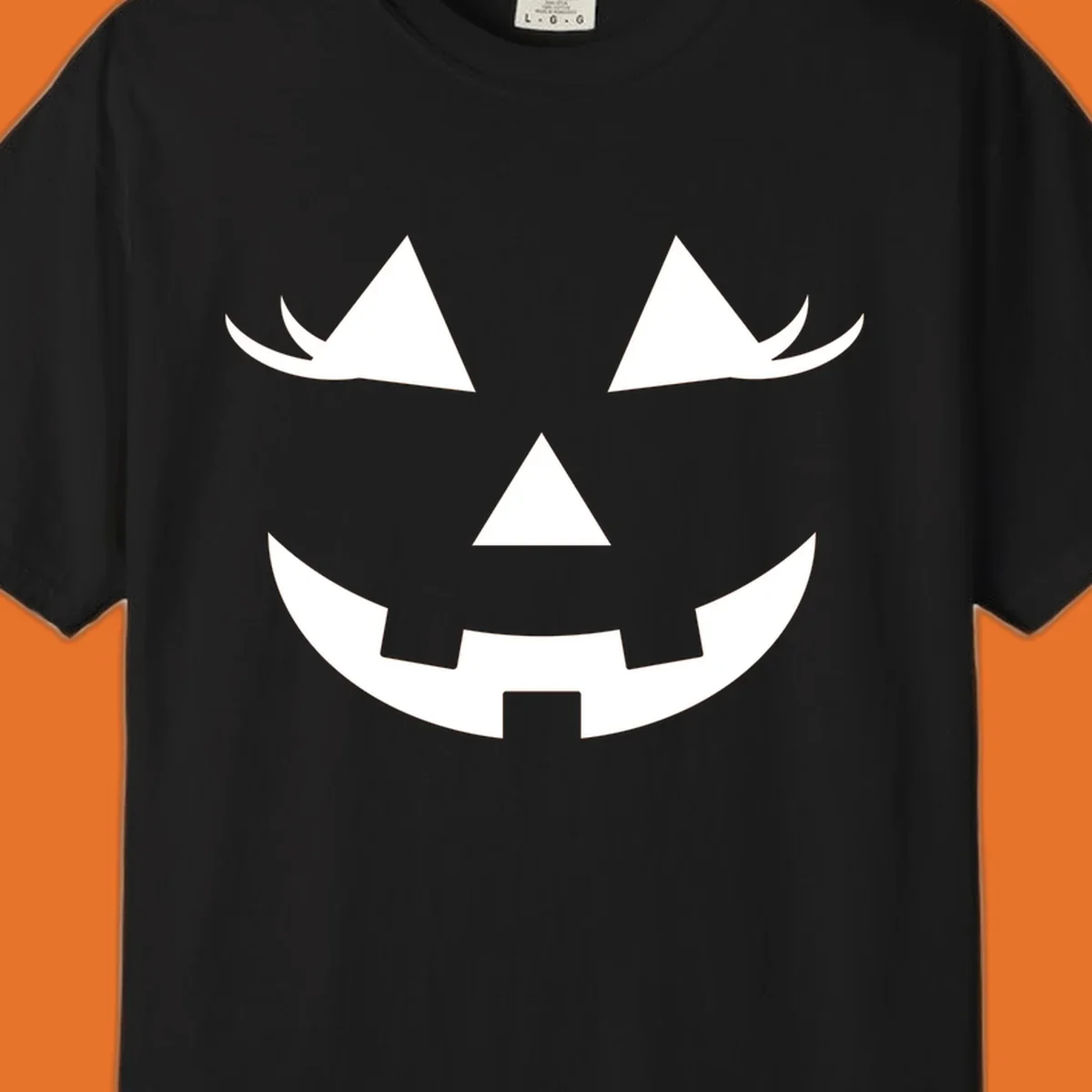 Jack o lantern face with triangular eyes and a jagged smile, classic halloween graphic.