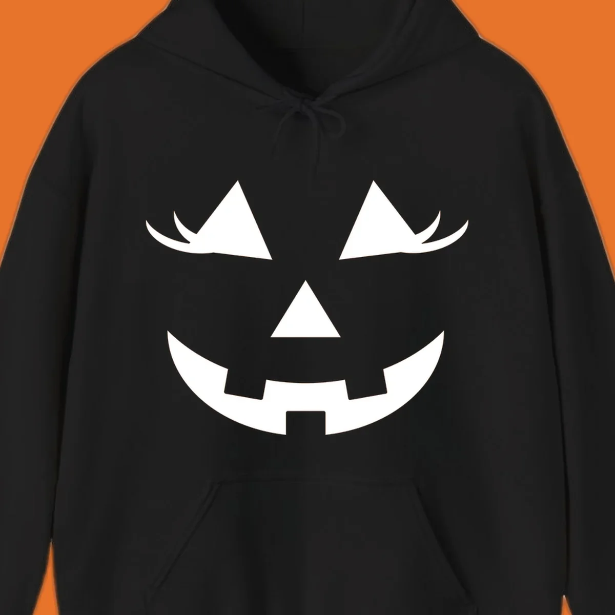 Jack o lantern face with triangular eyes and a jagged smile, classic halloween graphic.