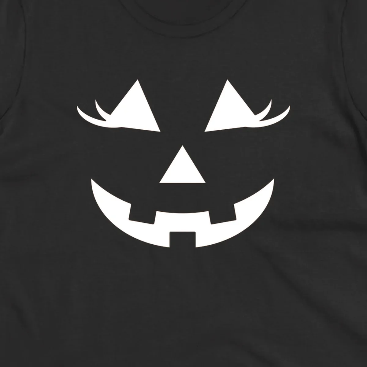 Jack o lantern face with triangular eyes and a jagged smile, classic halloween graphic.