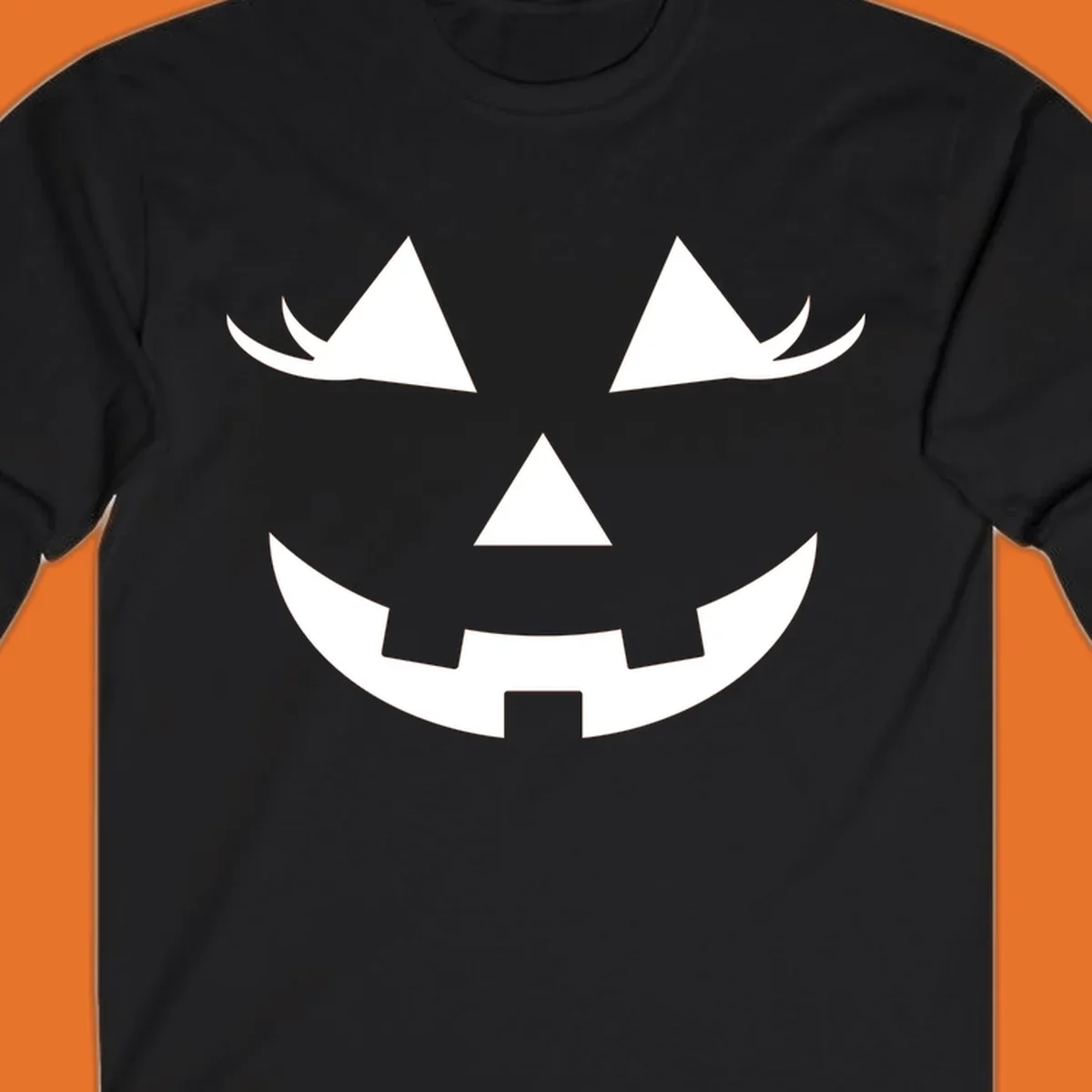 Jack o lantern face with triangular eyes and a jagged smile, classic halloween graphic.