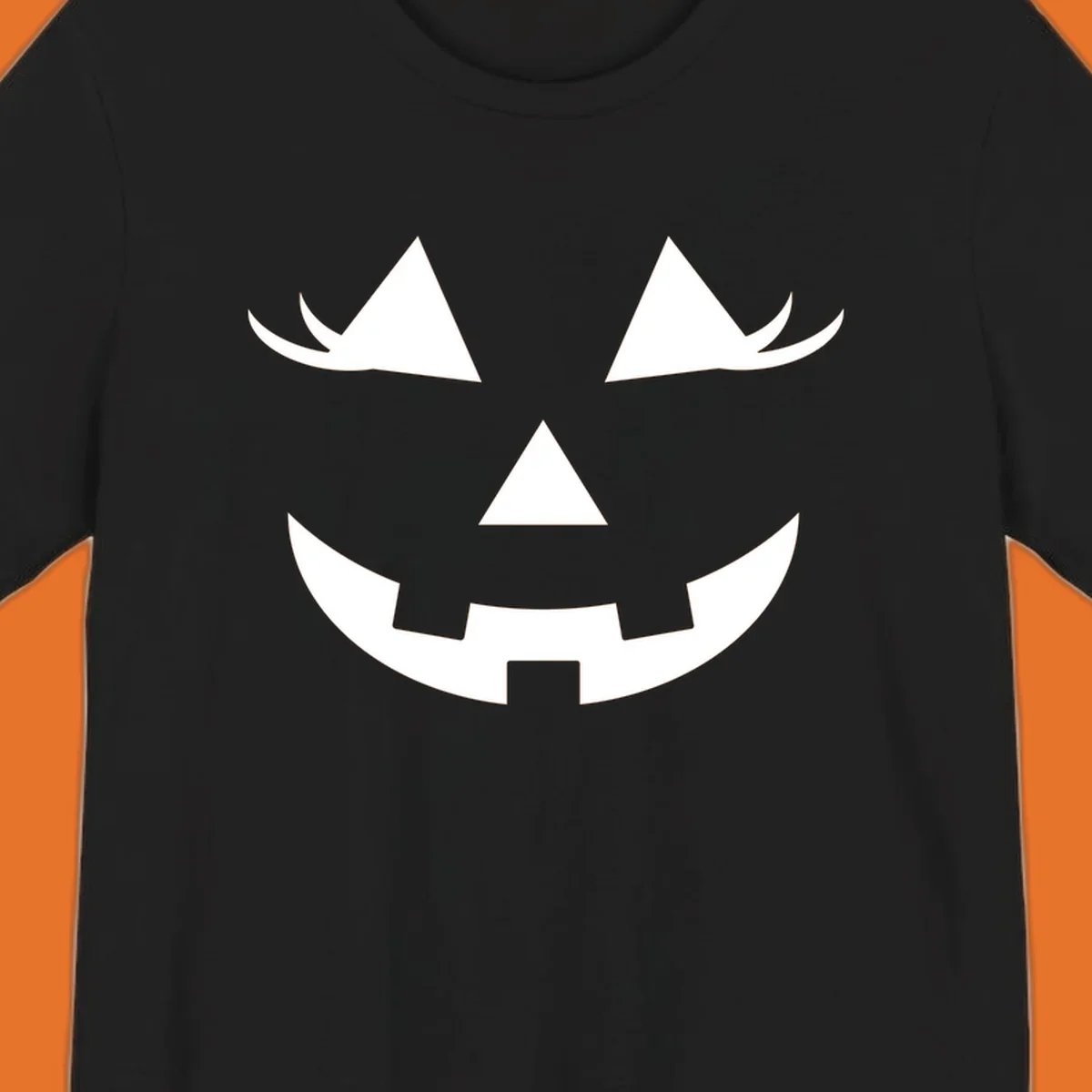 Jack o lantern face with triangular eyes and a jagged smile, classic halloween graphic.