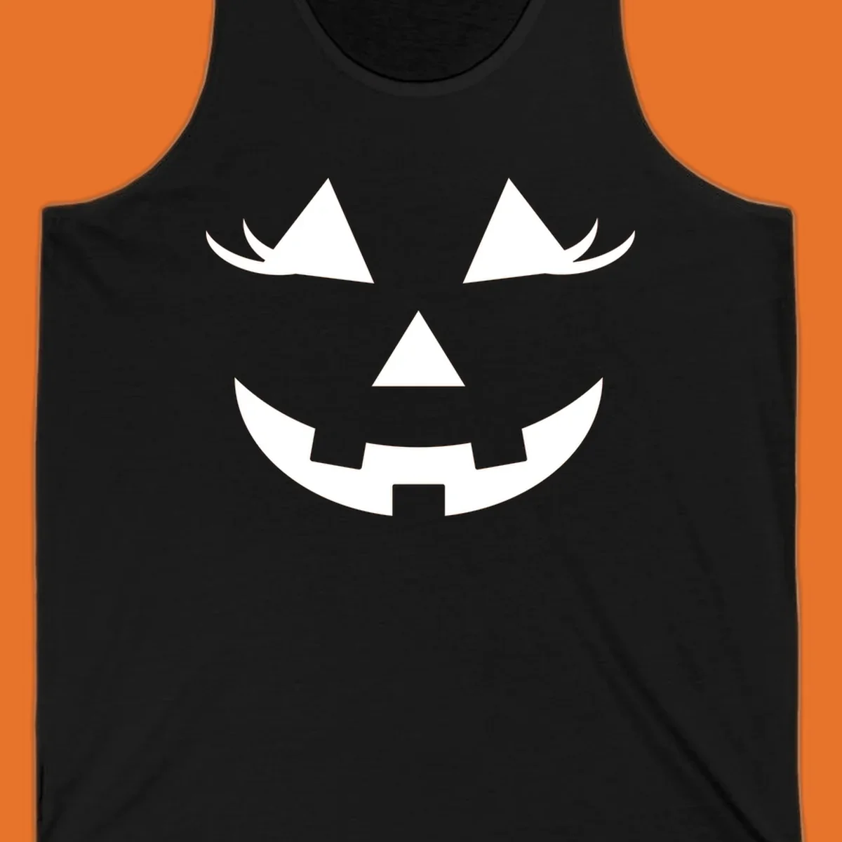 Jack o lantern face with triangular eyes and a jagged smile, classic halloween graphic.