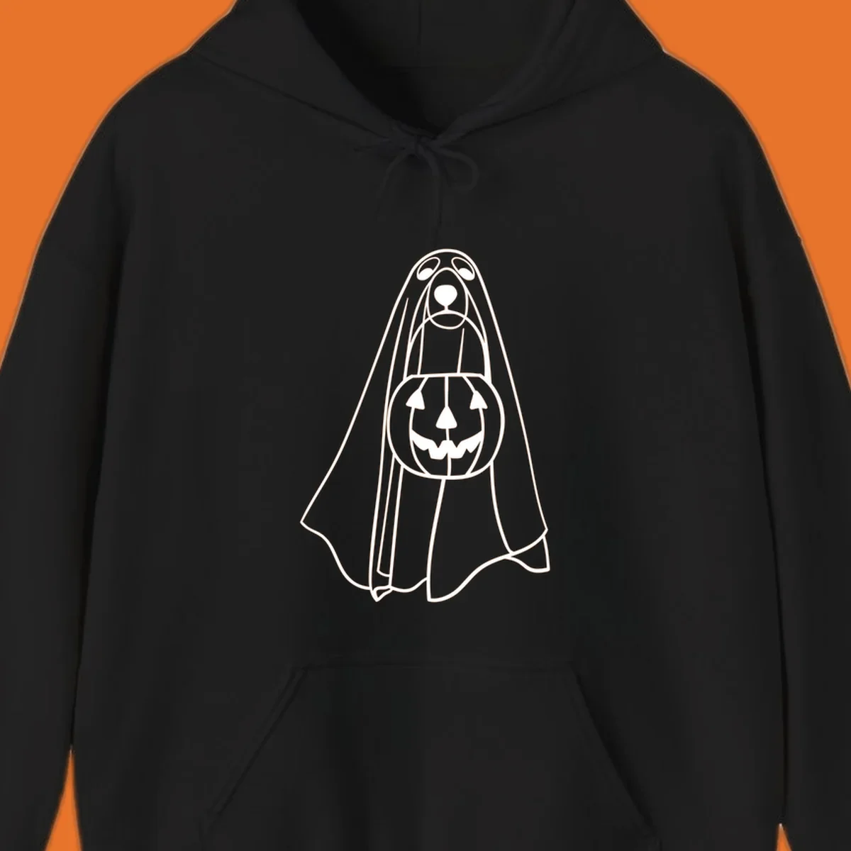 Line art of a dog dressed as a ghost holding a pumpkin candy bucket for Halloween.