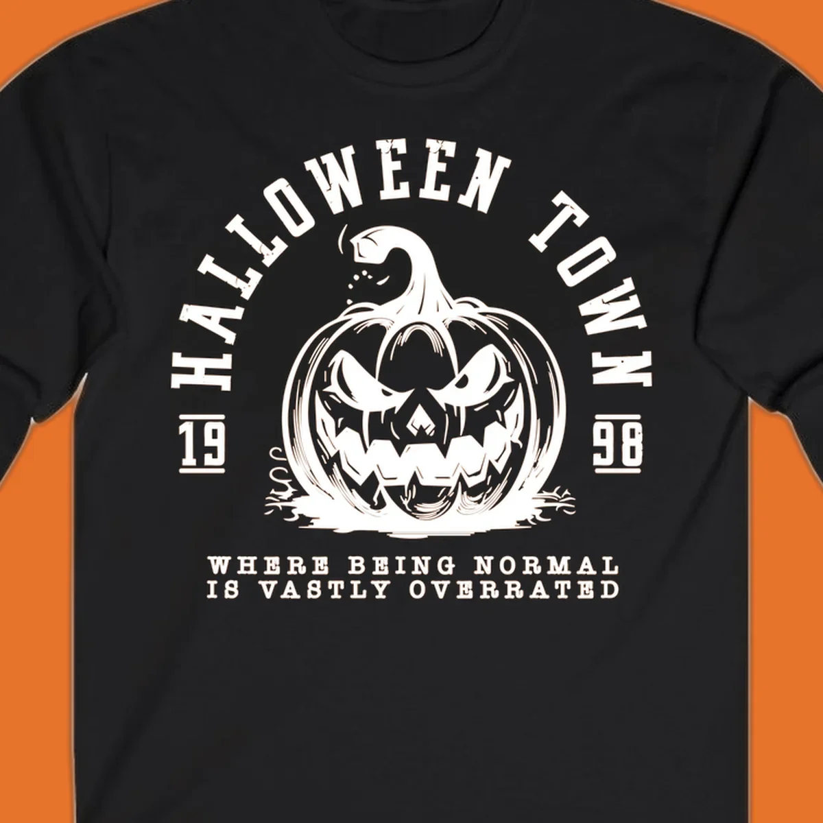 Halloween Town pumpkin illustration with text 'Where Being Normal Is Vastly Overrated'