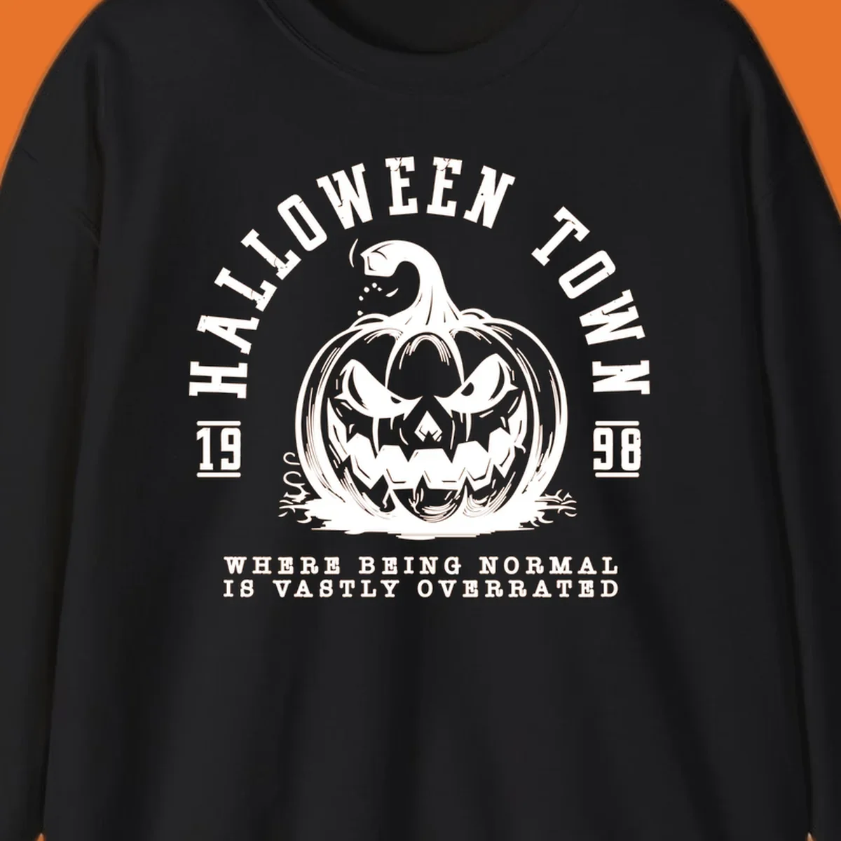 Halloween Town pumpkin illustration with text 'Where Being Normal Is Vastly Overrated'