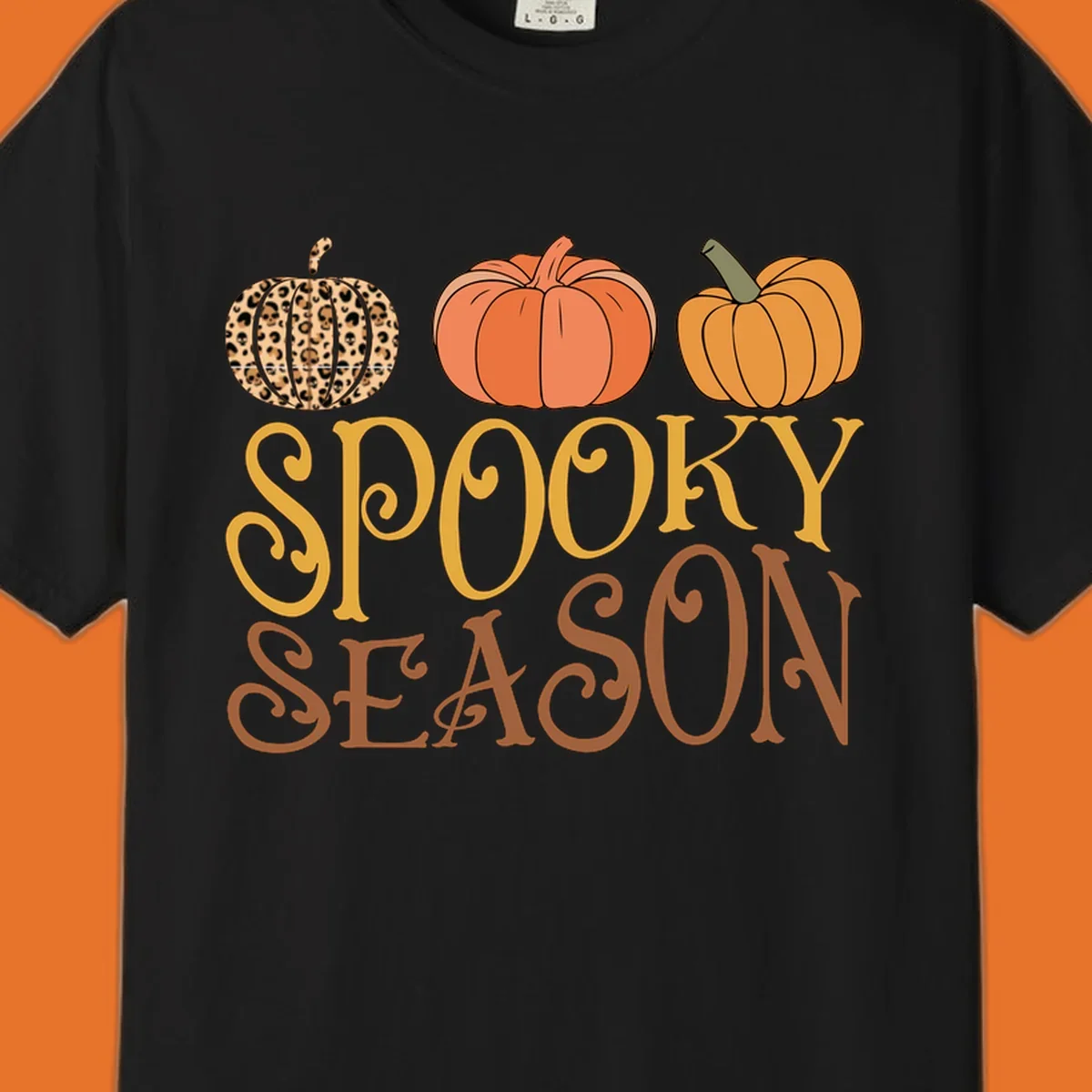 Spooky season pumpkins with leopard print and skull design, text: SPOOKY SEASON.