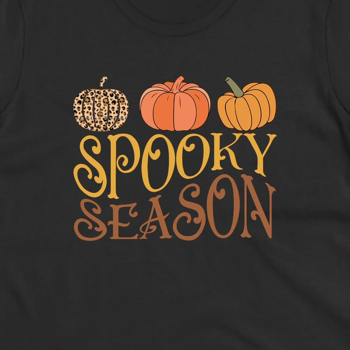 Spooky season pumpkins with leopard print and skull design, text: SPOOKY SEASON.