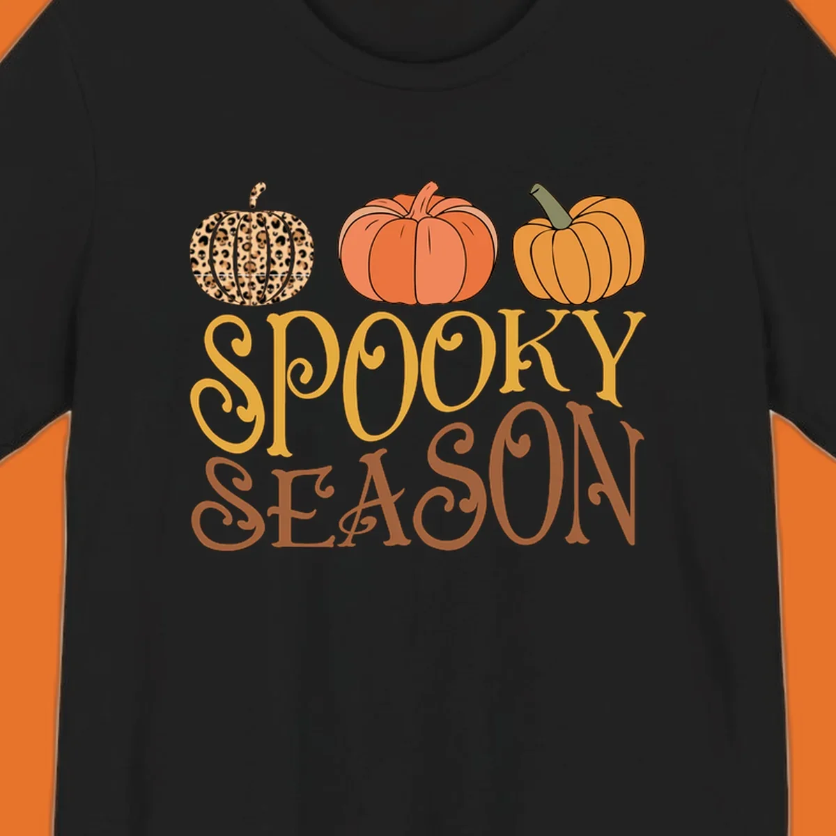 Spooky season pumpkins with leopard print and skull design, text: SPOOKY SEASON.