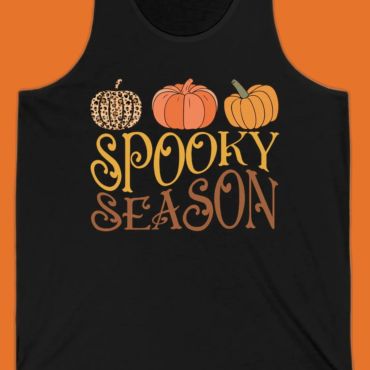 Spooky season pumpkins with leopard print and skull design, text: SPOOKY SEASON.