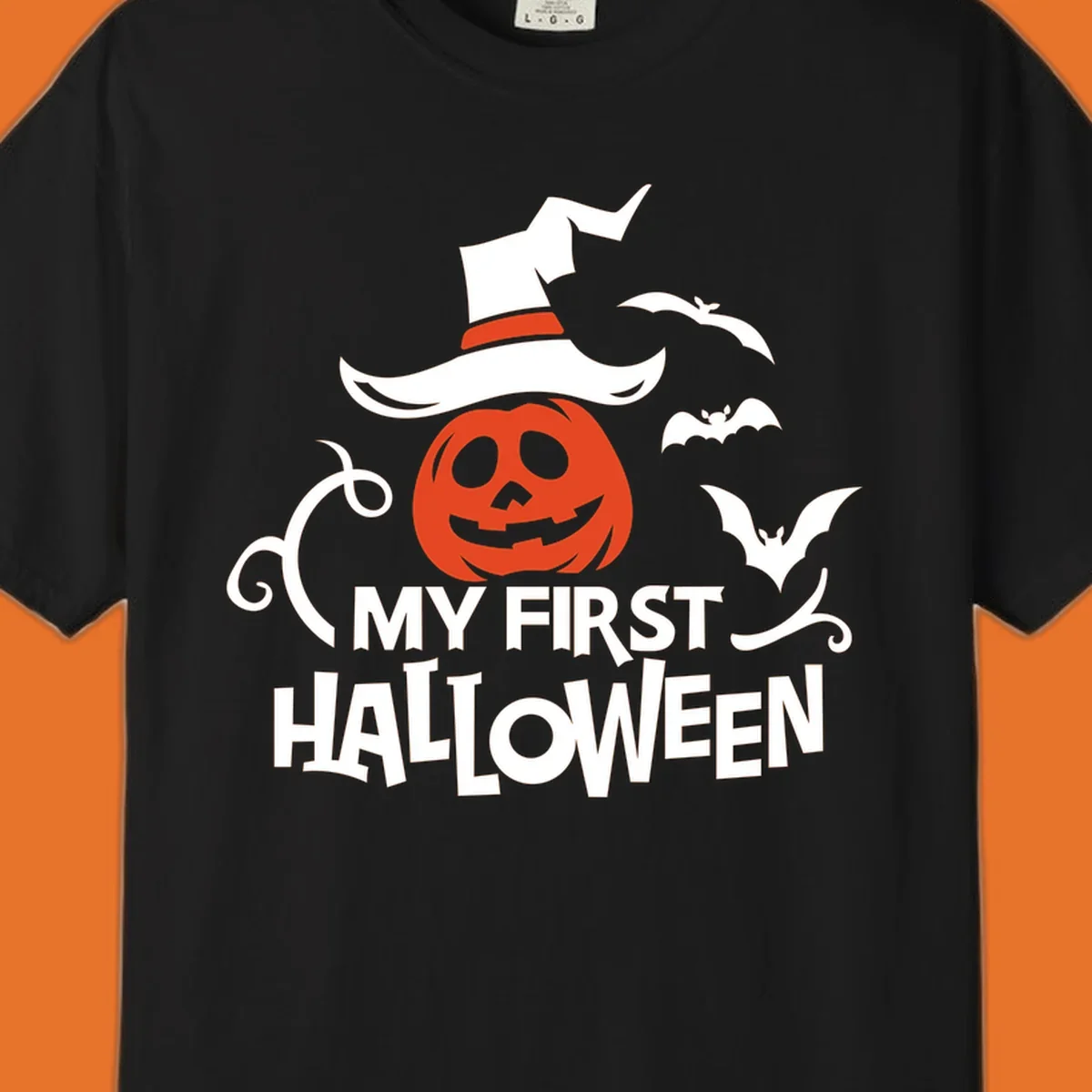 My First Halloween text with a pumpkin wearing a witch hat and bats.