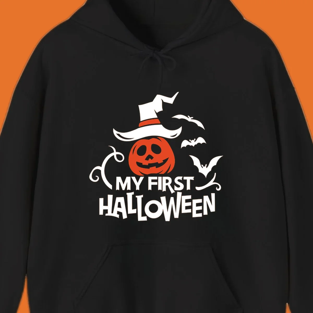 My First Halloween text with a pumpkin wearing a witch hat and bats.