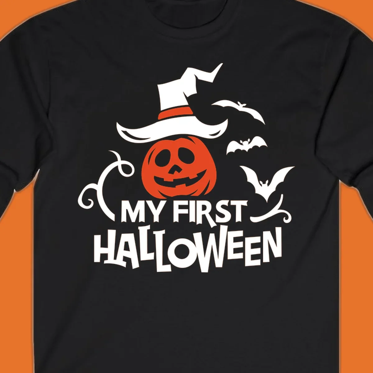 My First Halloween text with a pumpkin wearing a witch hat and bats.