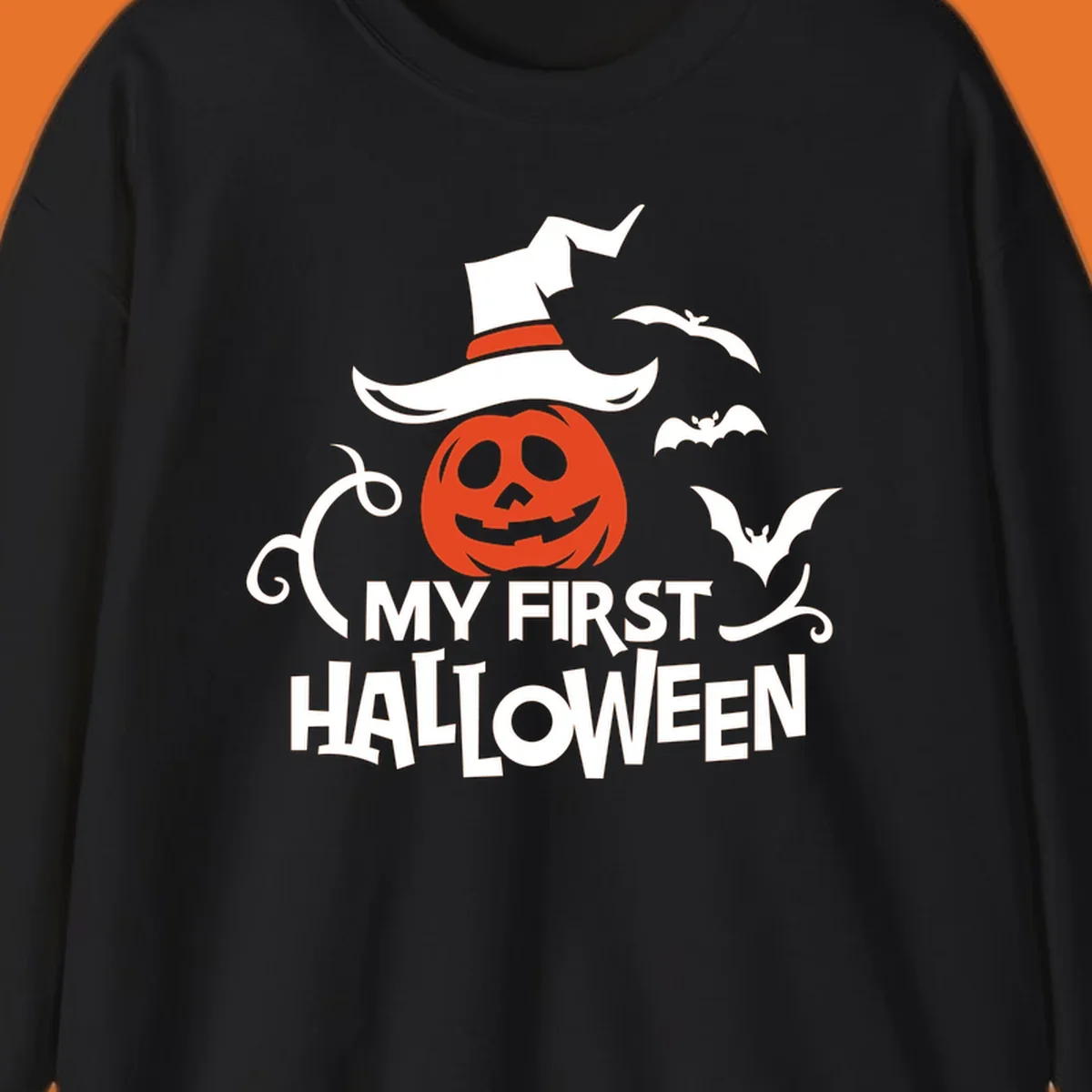 My First Halloween text with a pumpkin wearing a witch hat and bats.