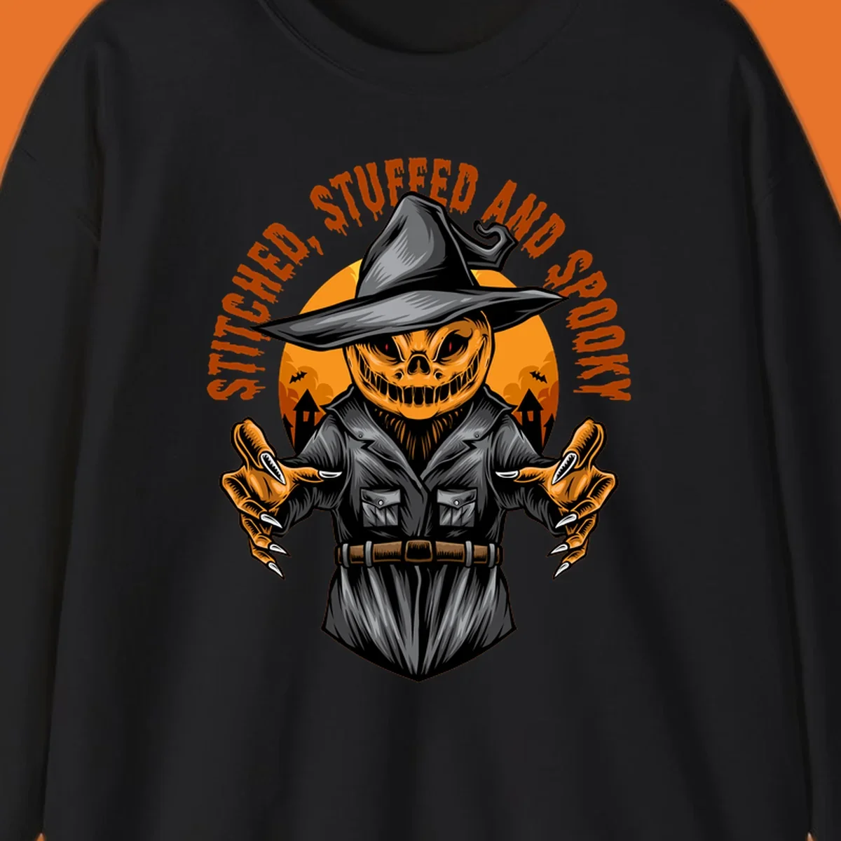 Spooky pumpkin character in a witch hat and suit, text reads STITCHED, STUFFED AND SPOOKY.