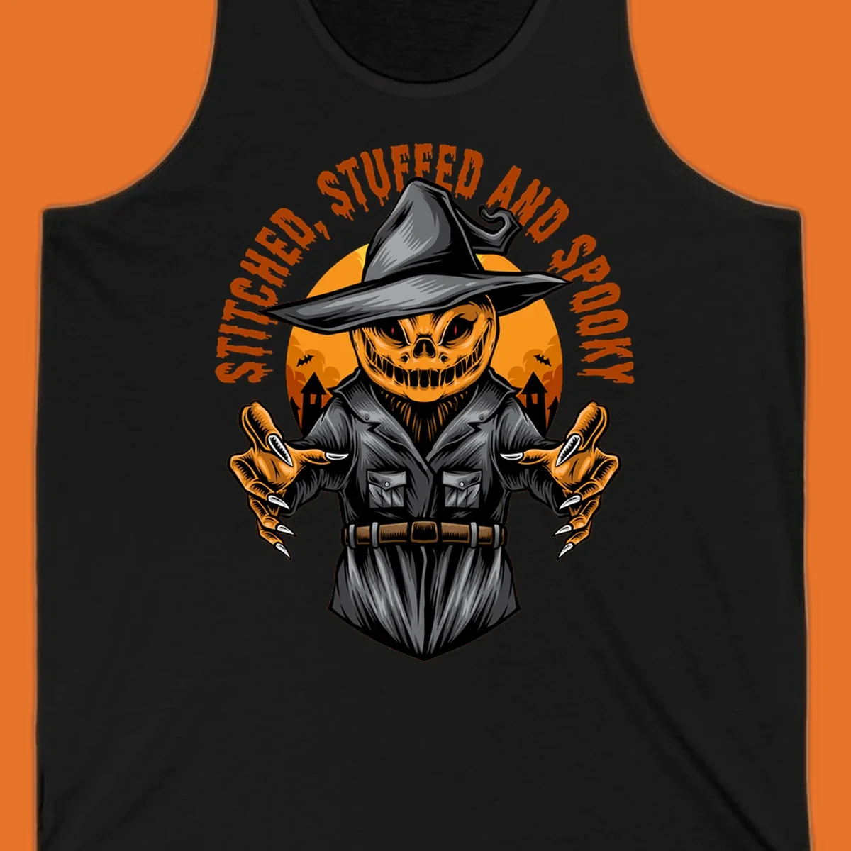 Spooky pumpkin character in a witch hat and suit, text reads STITCHED, STUFFED AND SPOOKY.