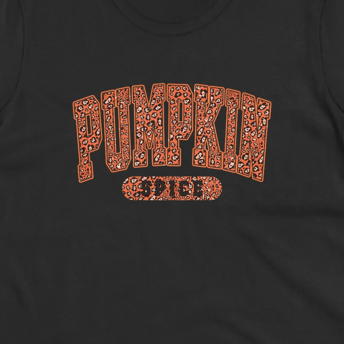 Pumpkin Spice text with leopard print pattern on dark outline, on black background.