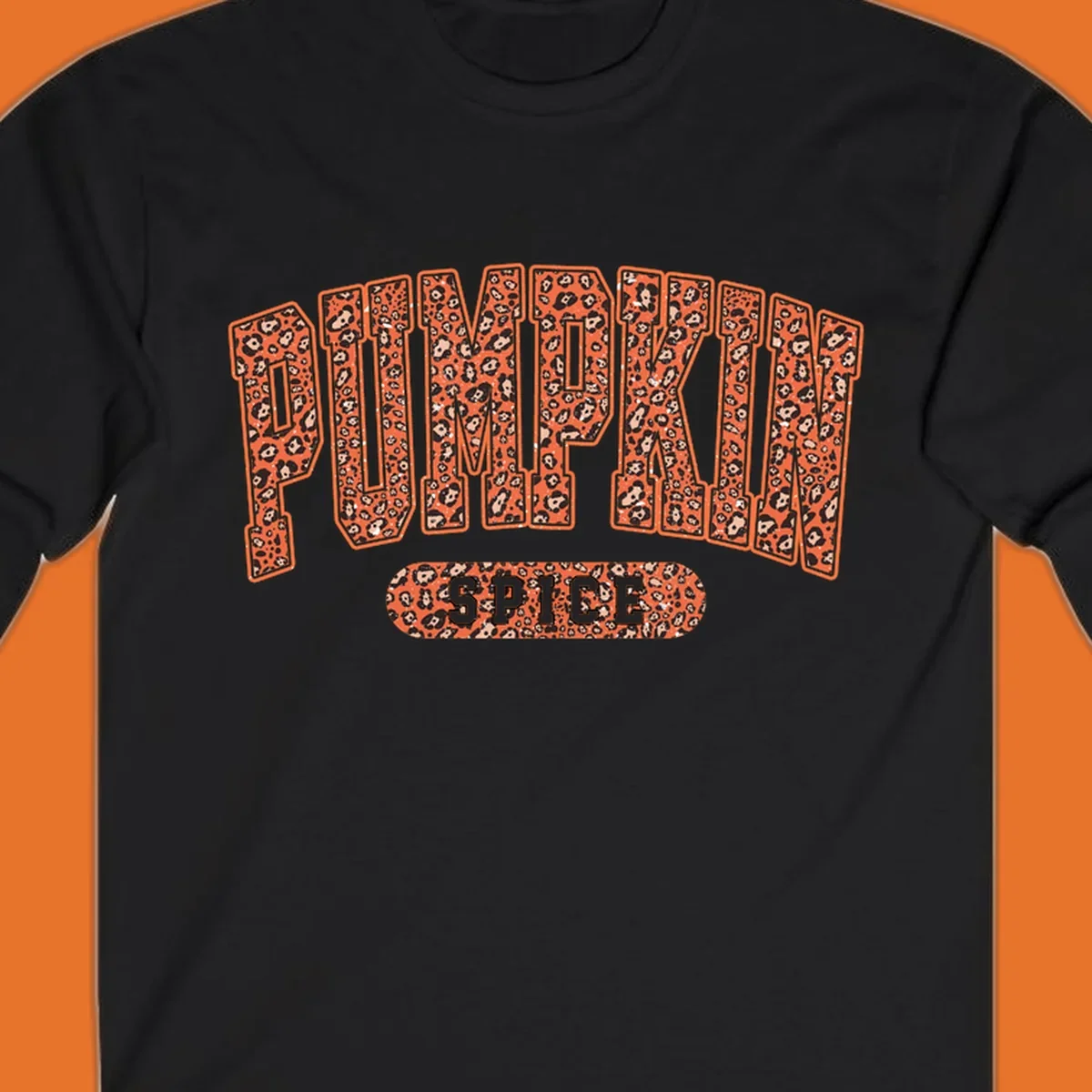 Pumpkin Spice text with leopard print pattern on dark outline, on black background.