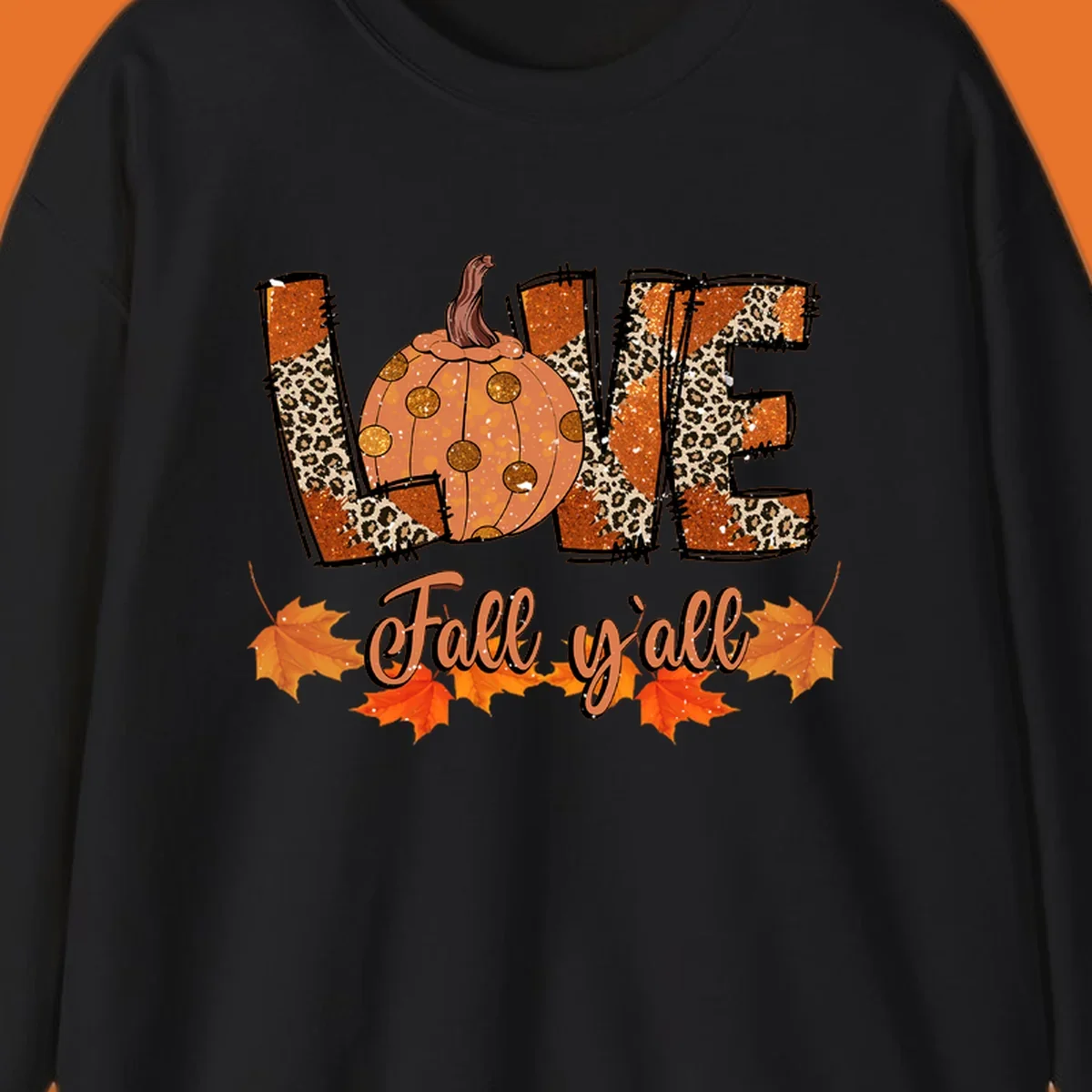 Fall love pumpkin with leopard print and 'Fall y'all' text, surrounded by maple leaves.