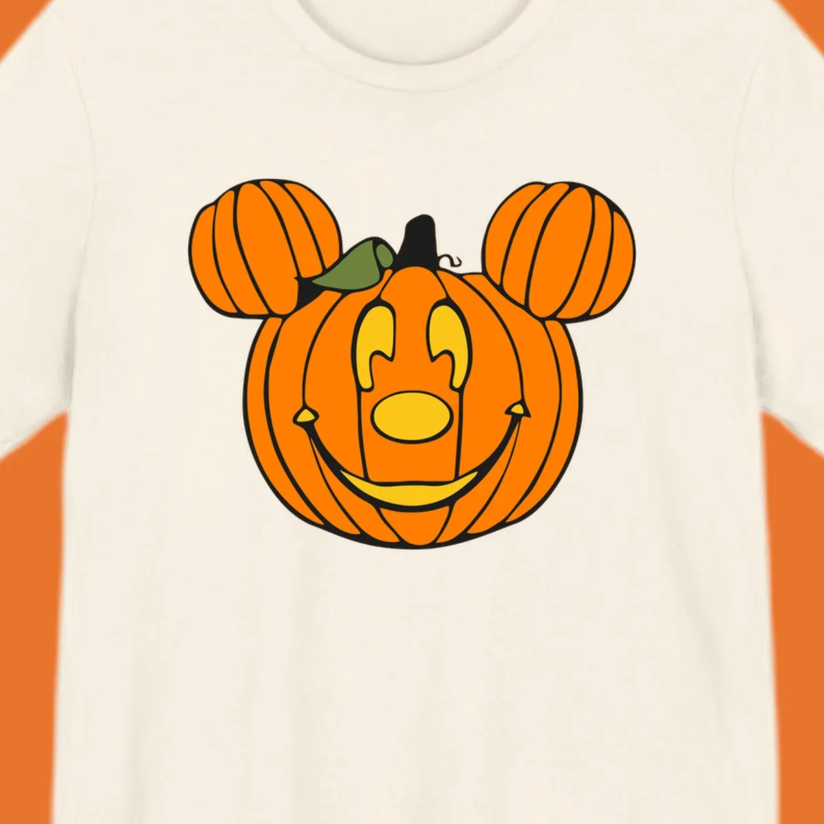 Mickey pumpkin halloween jack-o-lantern graphic with smiling face and ears.