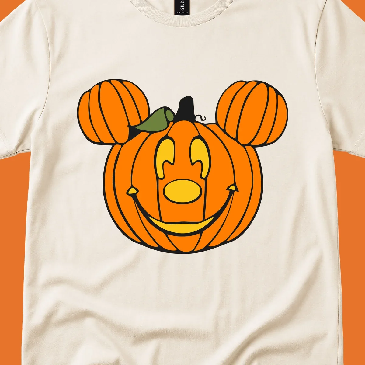 Mickey pumpkin halloween jack-o-lantern graphic with smiling face and ears.