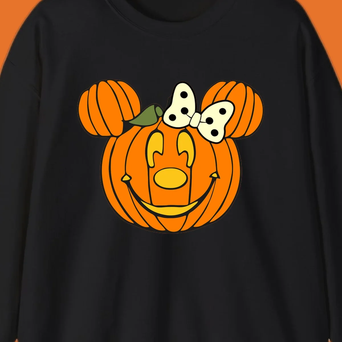 Minnie Mouse pumpkin Halloween graphic with ears and bow