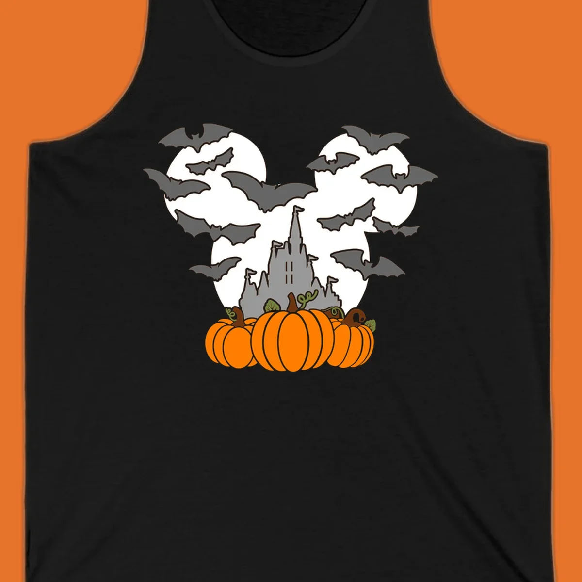 Halloween castle with bats and pumpkins against a Mickey Mouse ears moon graphic.