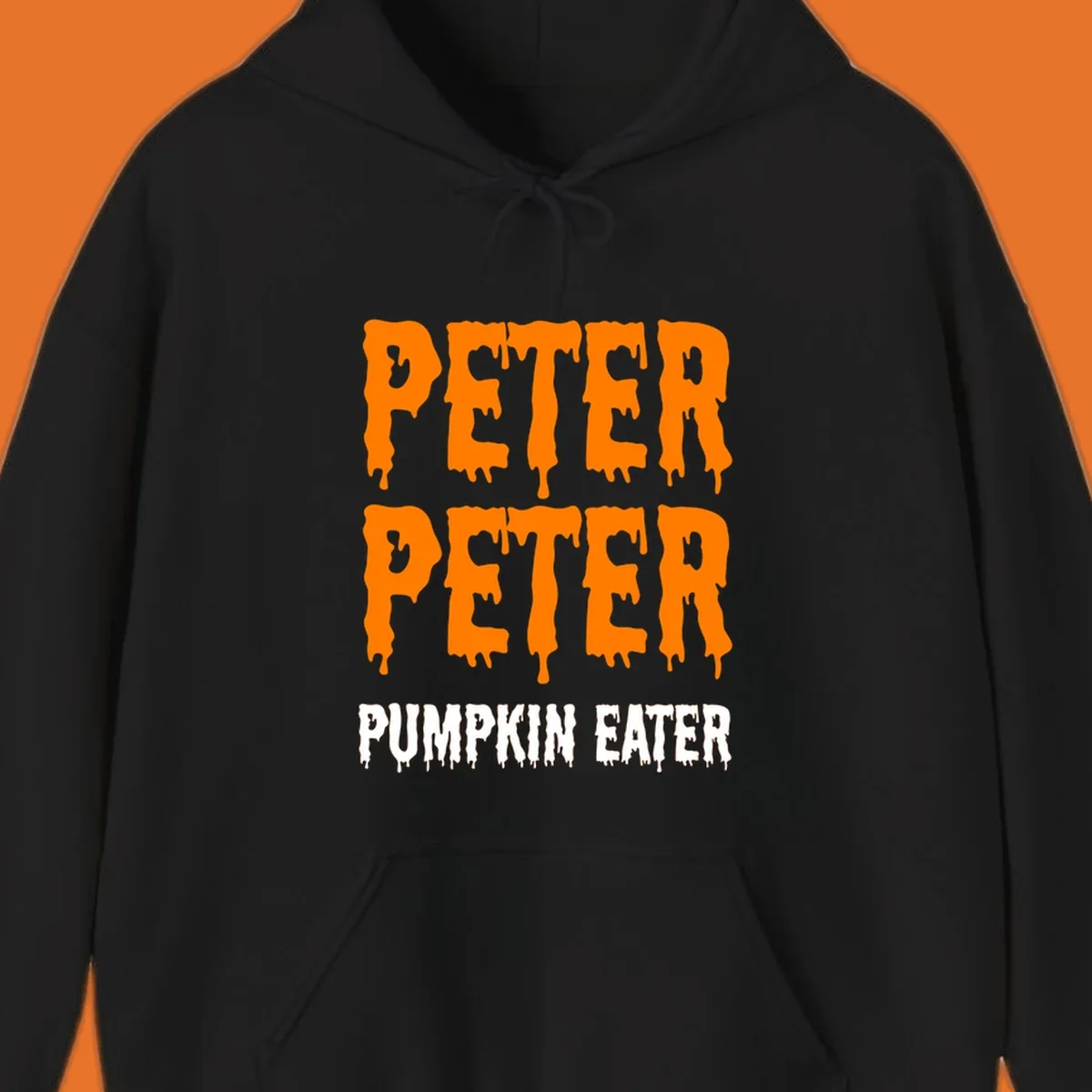 Peter Peter Pumpkin Eater text design with dripping orange and white letters on a black background.