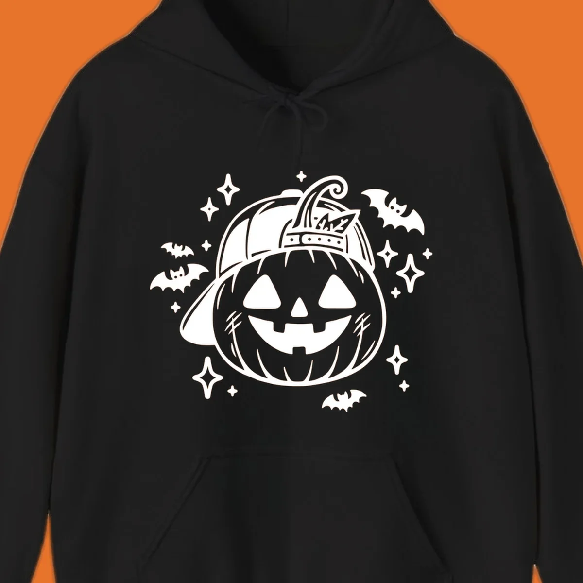 Cool halloween pumpkin in a baseball cap with bats and stars, black and white graphic.