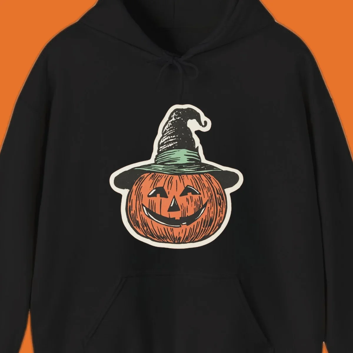 Vintage illustration of a smiling jack-o-lantern wearing a witch hat, perfect for halloween-pumpkin-witch themed apparel.