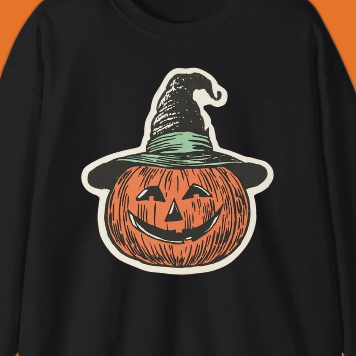 Vintage illustration of a smiling jack-o-lantern wearing a witch hat, perfect for halloween-pumpkin-witch themed apparel.