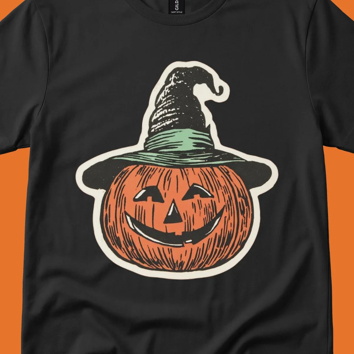 Vintage illustration of a smiling jack-o-lantern wearing a witch hat, perfect for halloween-pumpkin-witch themed apparel.