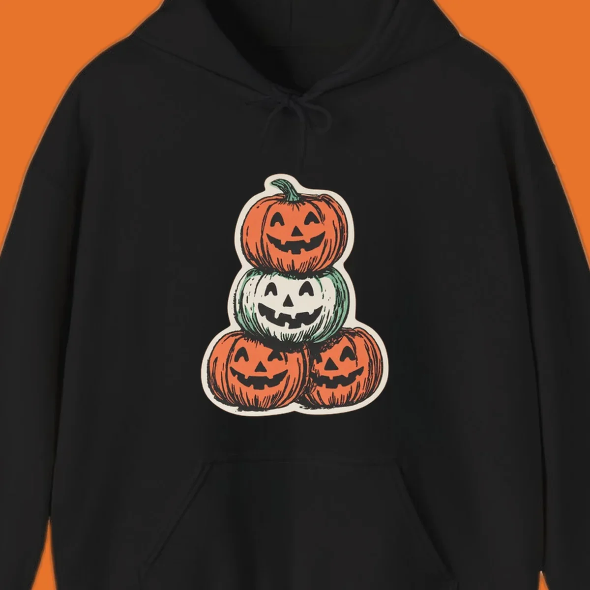 Stacked halloween pumpkins trio illustration with carved faces.