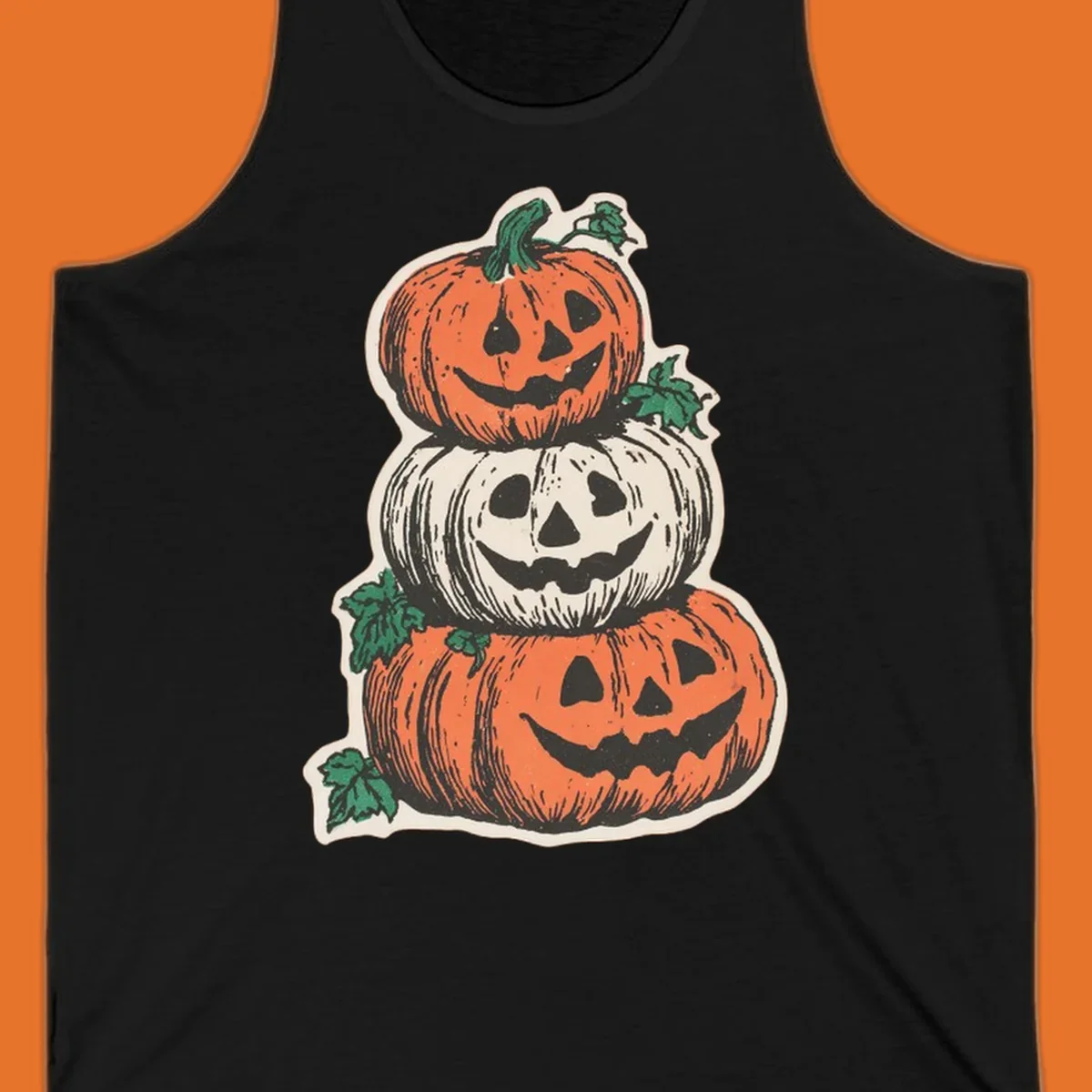 Stacked Halloween jack-o'-lanterns graphic with leaves for fall holiday shirts.