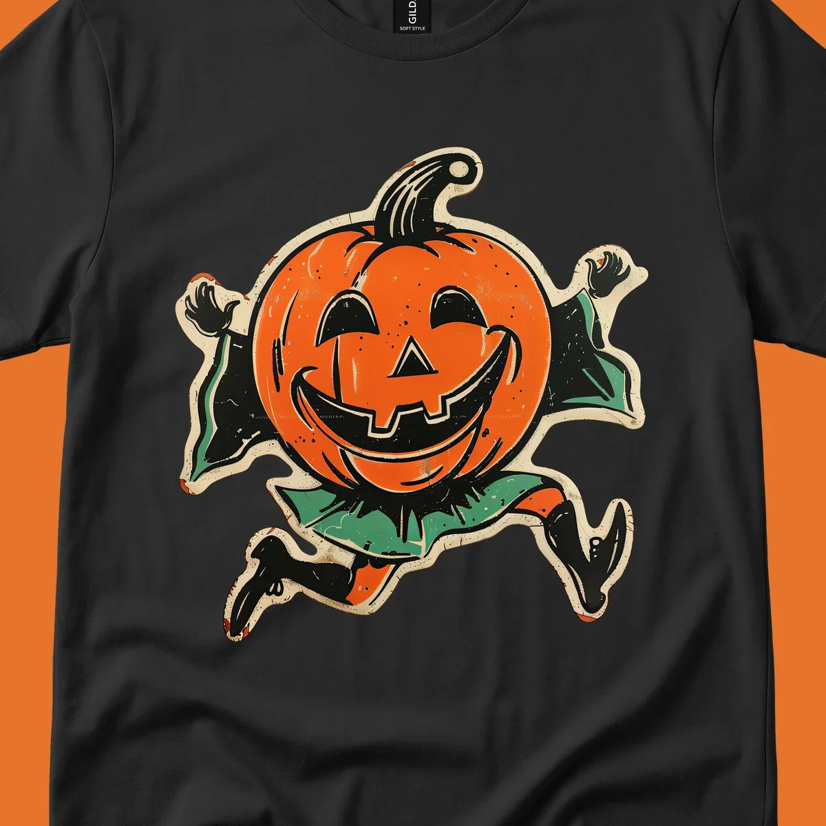 Vintage running jack-o'-lantern graphic with a big smile, black boots, and green leaves.
