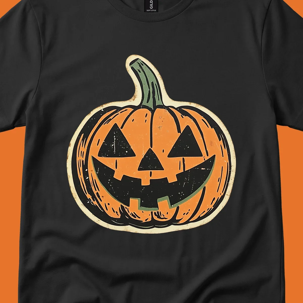 Vintage jack-o'-lantern graphic with a distressed, carved face. Fall holiday illustration.