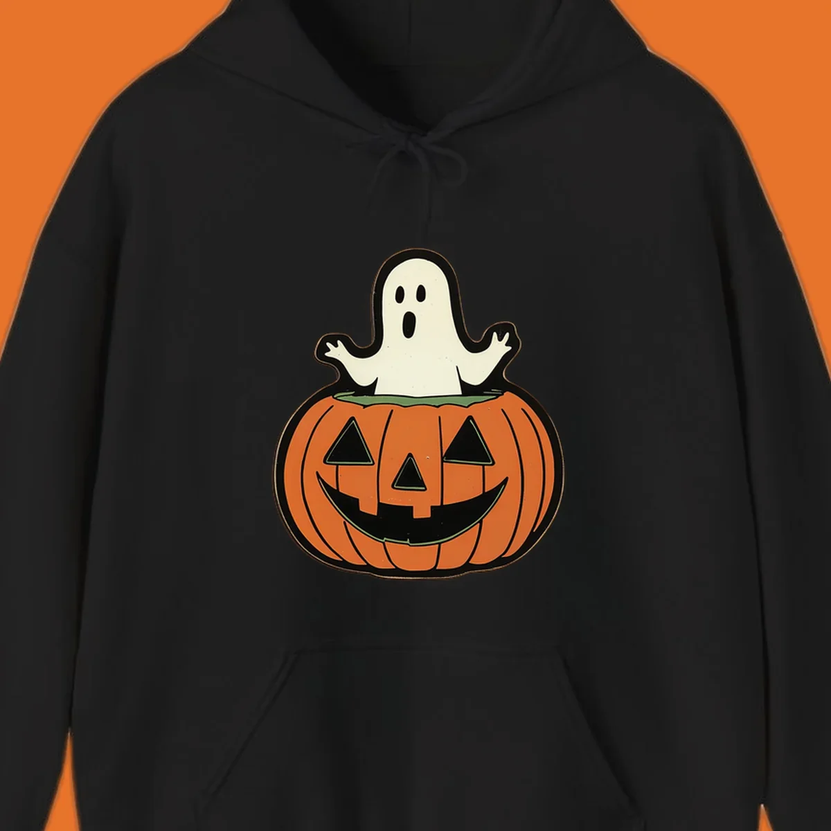 Halloween pumpkin with a ghost popping out, holiday graphic