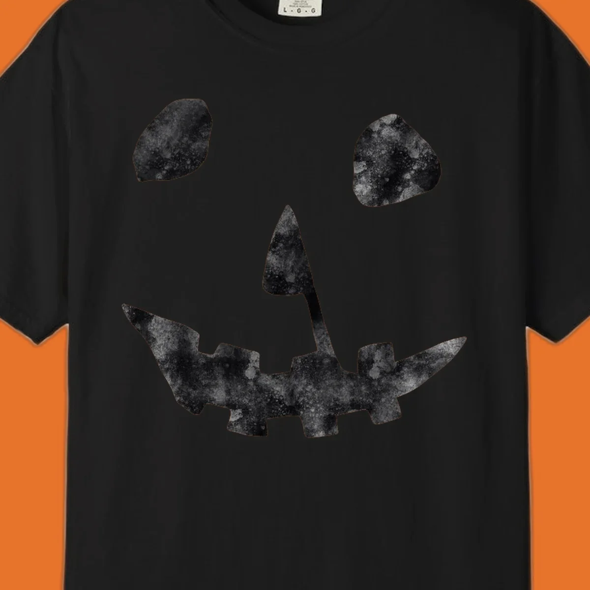 Spooky jack o lantern face graphic with distressed texture for Halloween.