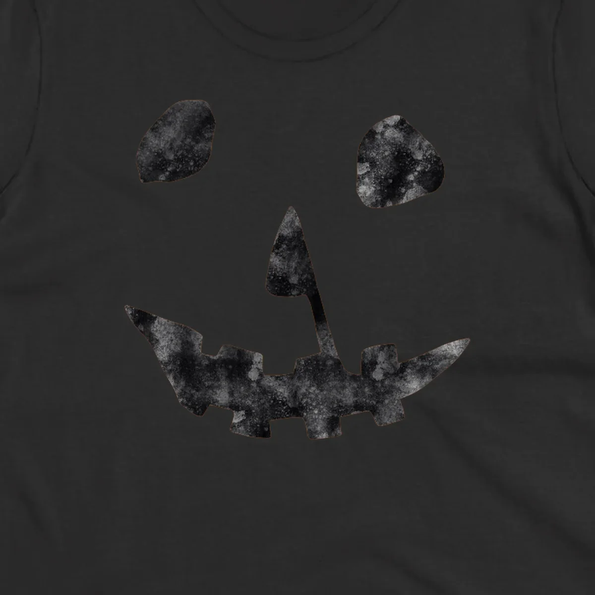 Spooky jack o lantern face graphic with distressed texture for Halloween.