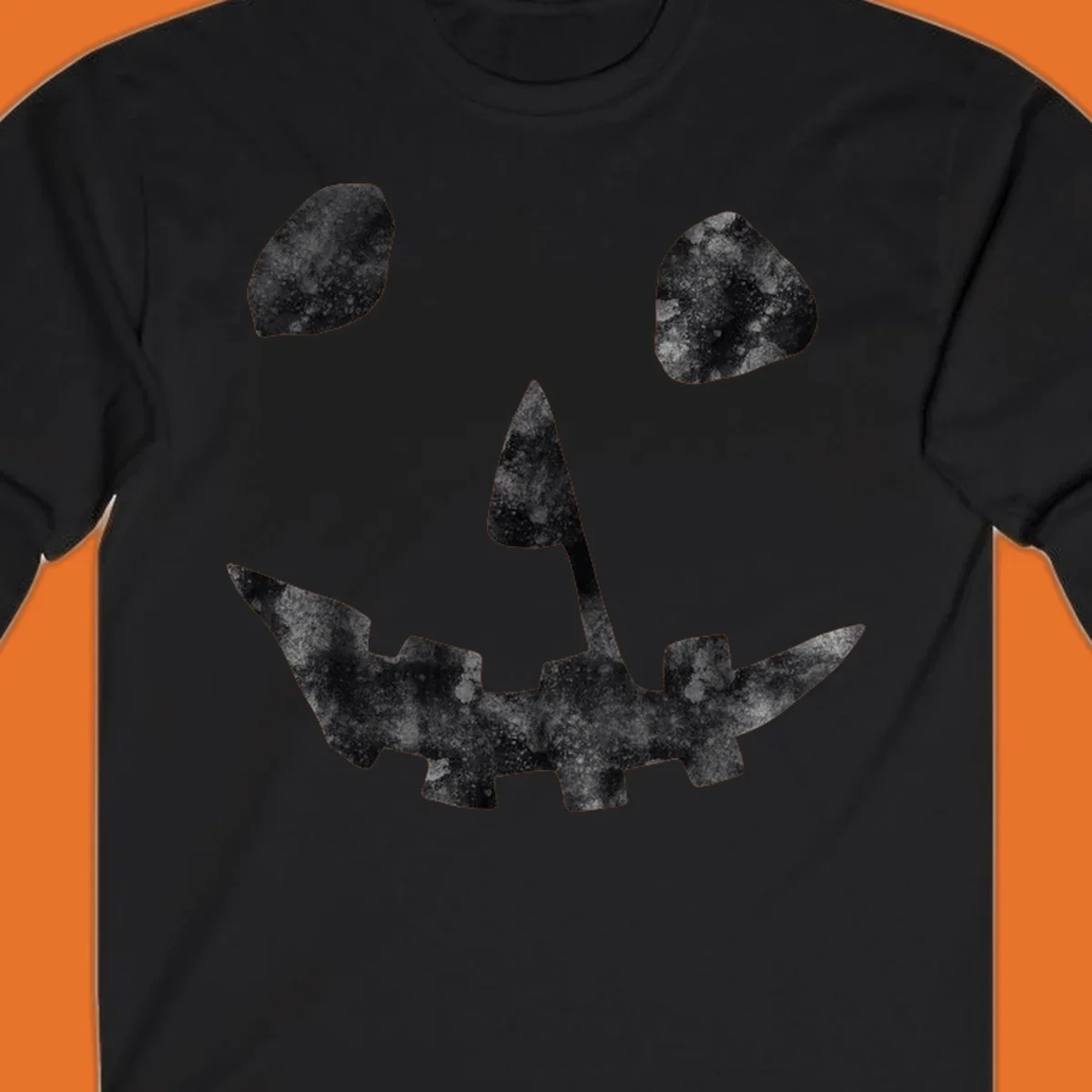 Spooky jack o lantern face graphic with distressed texture for Halloween.